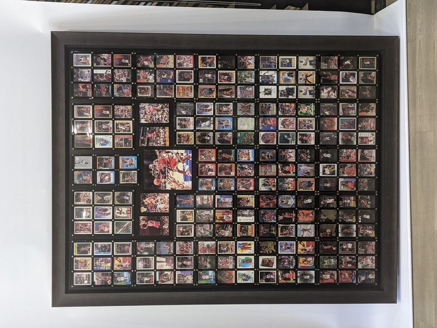 Framed Michael Jordan trading card collection
